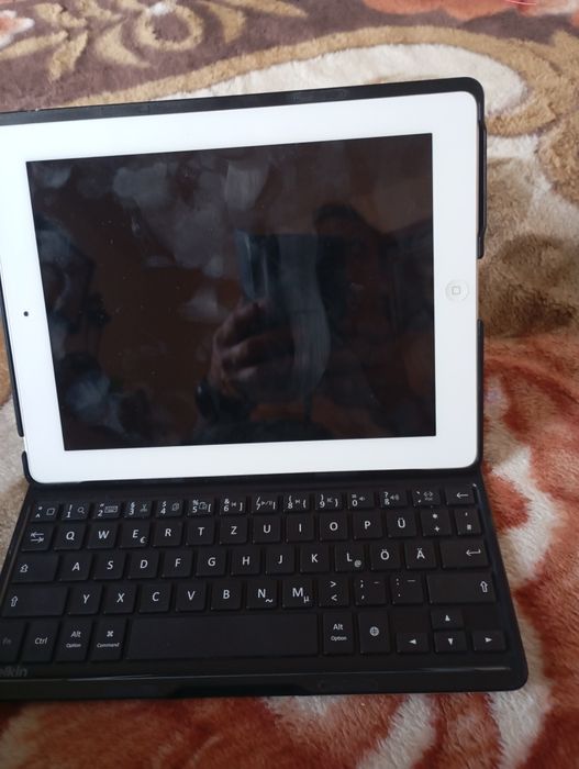 Samsung și IPad se vede in fotografii