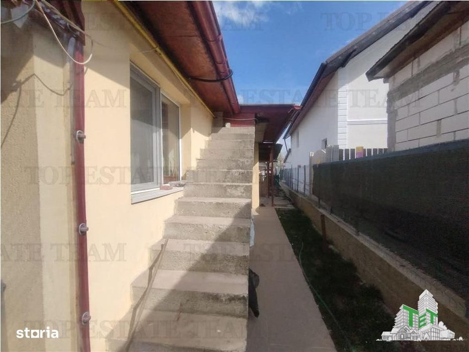 Teren generos 700 mp, include casa cu panouri fotovoltaice, langa Bucu