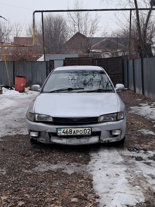 Машина митсубиши мираж