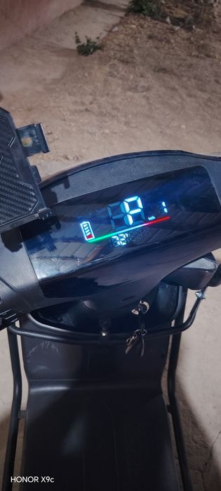 Sukuter electroni king