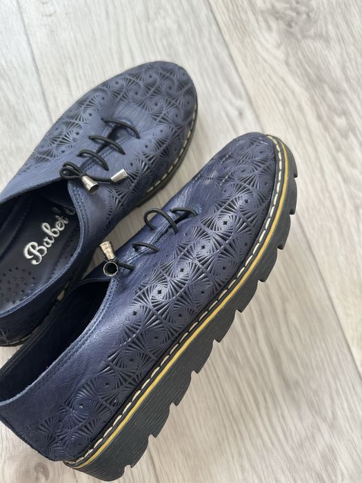 Женская ботинка.