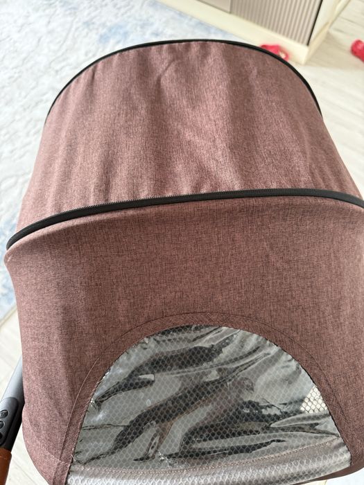 Продам всесезонную прогулочную коляску tomix