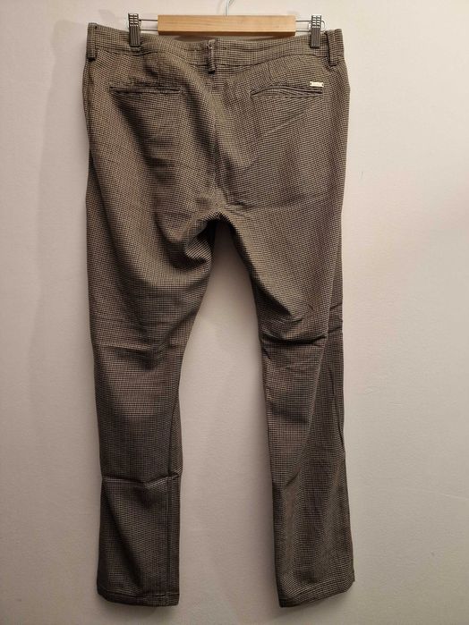 Pantaloni eleganți bej