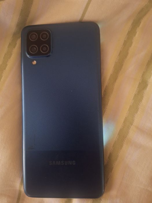 Samsung    A 12    4+4 Ram.