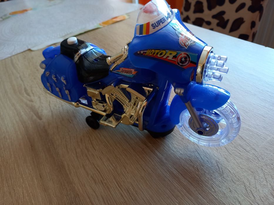 Jucarie motocicleta,cu bateri.Pret.30 lei.