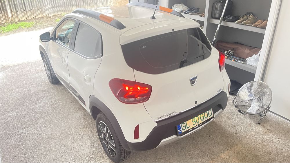 Dacia Spring 2023 – electrică – cameră marsarier – piele – 2 seturi roți – garanție