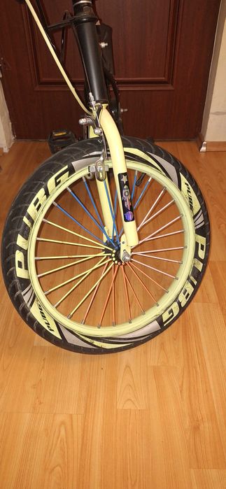 Bicicleta copii ca noua cu roti ajutatoare action one