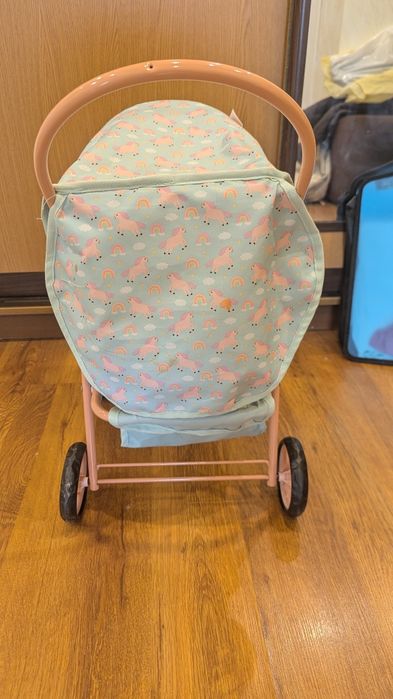 Игрушечная коляска