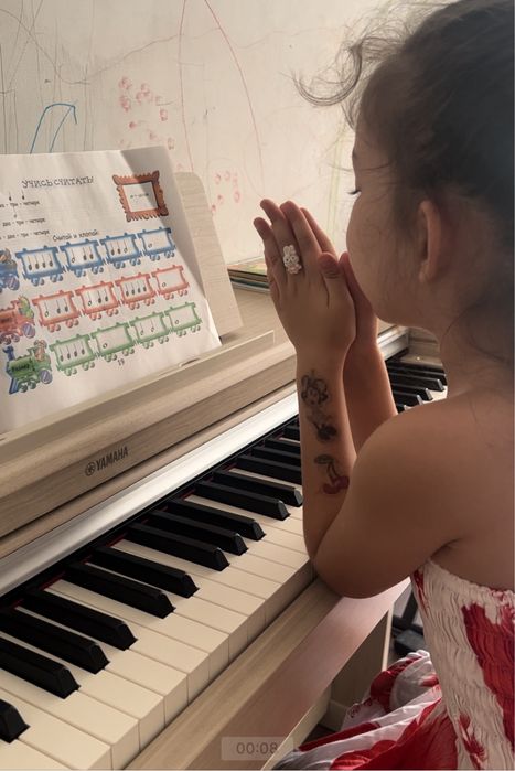 Репетитор по фортепиано