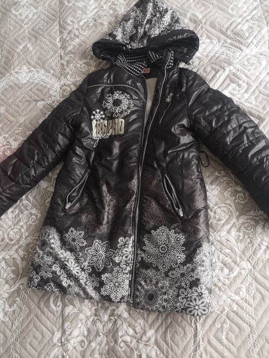 Продам зимний пуховик для девочки