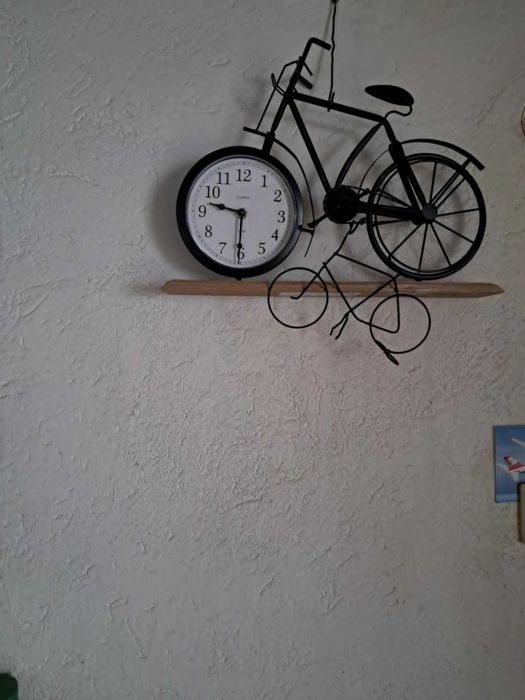 bicicleta ornamentala cu ceas functional si puiul ei