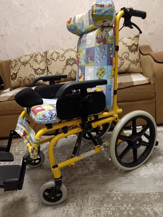 Детская инвалидная коляска