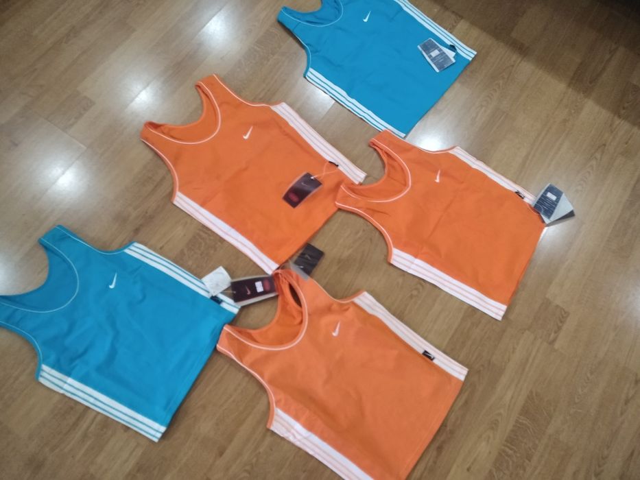 Женские майки  Nike.новые размер 42. 44