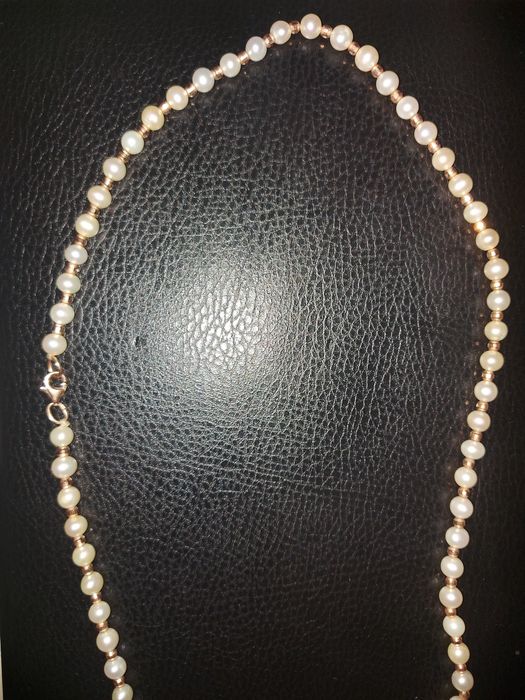 Нить жемчуга с золотом . 50 см