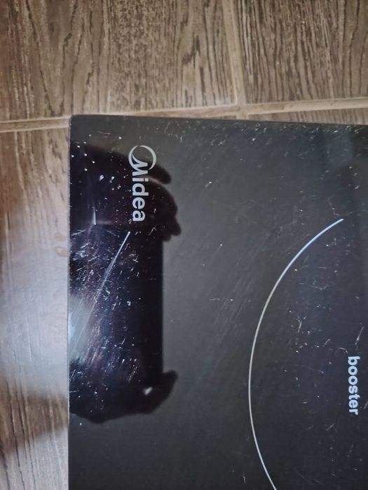 Индукционная плита Midea