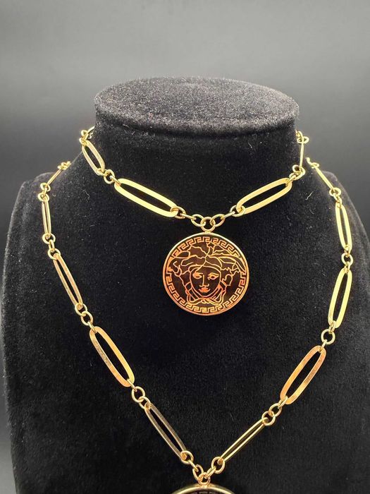 Dracula Amanet: Set Versace, Lant- 10,10gr/14k, bratara- 4.72gr/14k.