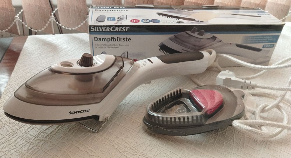 Пароочиститель. Отпариватель для одежды.