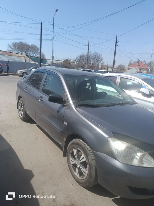 Авто Митцубиси Ланцер 2011г.