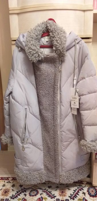 Продам новый пуховик