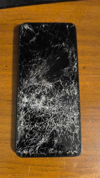 Телефони за части