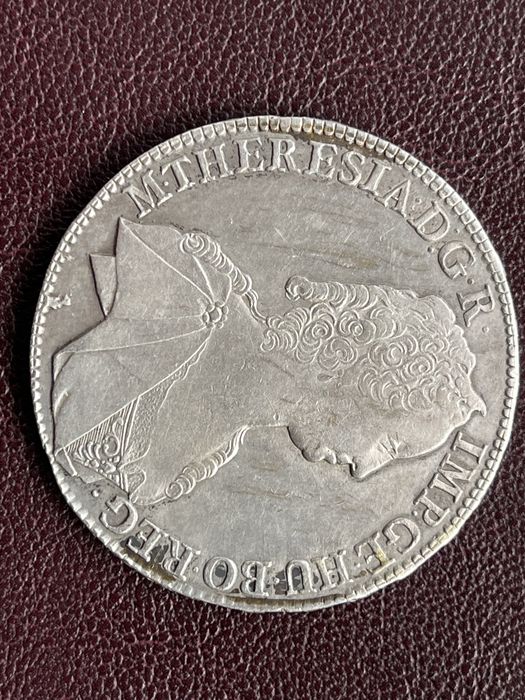 Vand moneda de argint