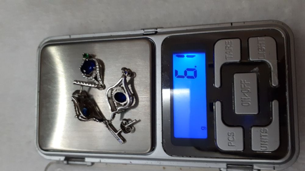 Серебряный комплект гвоздики и кулон