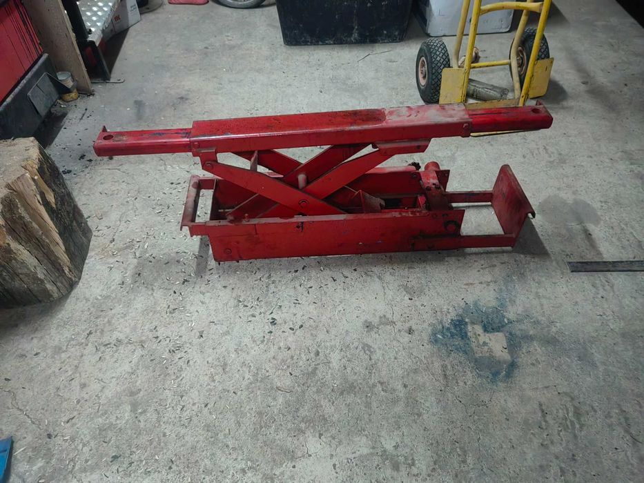 Elevator de canal tip foarfeca