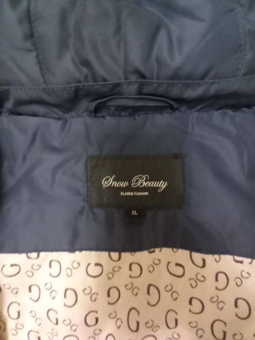 Пуховик женский.