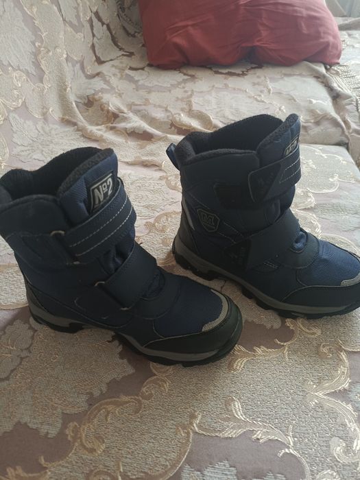 Продам зимние сапоги аляски