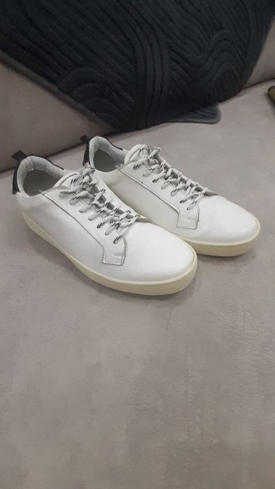 Продам мужские  кожаные кроссовки.