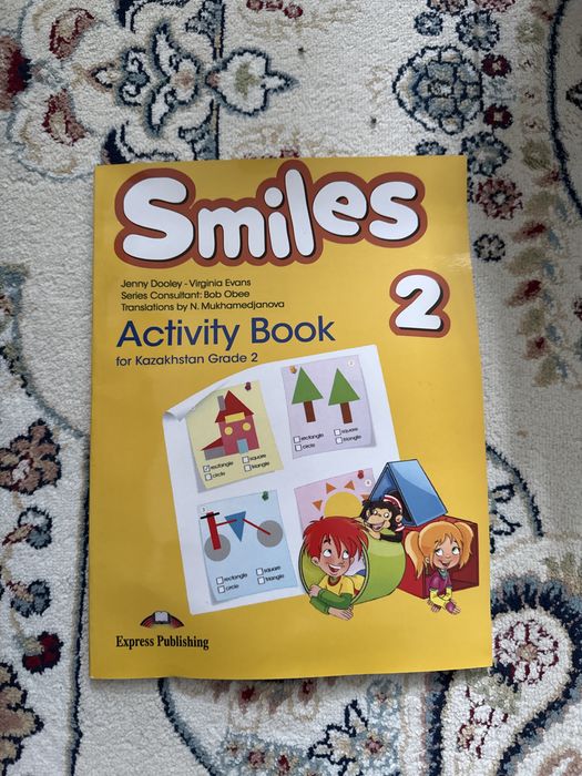 Книга по английскому языку «Smiles”