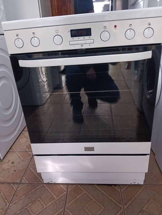 Свободно стояща печка с индукционни котлони VOSS  Electrolux Гаранция