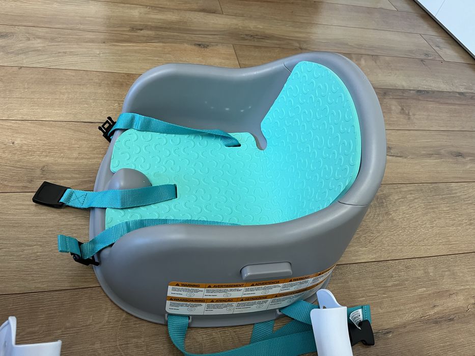 Scaunel Infantino 3 in 1 cu lumini si muzica Discovery Seat Booster