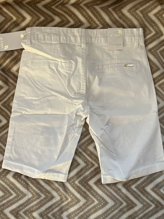 Дамски бели дънки над коляно