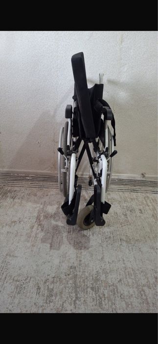 Инвалидный коляска