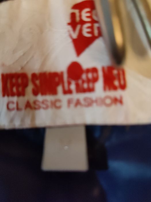 Пуховик комбинированный с синим. До колена.