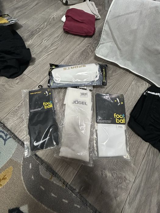 Продам новые гетры, щитки
