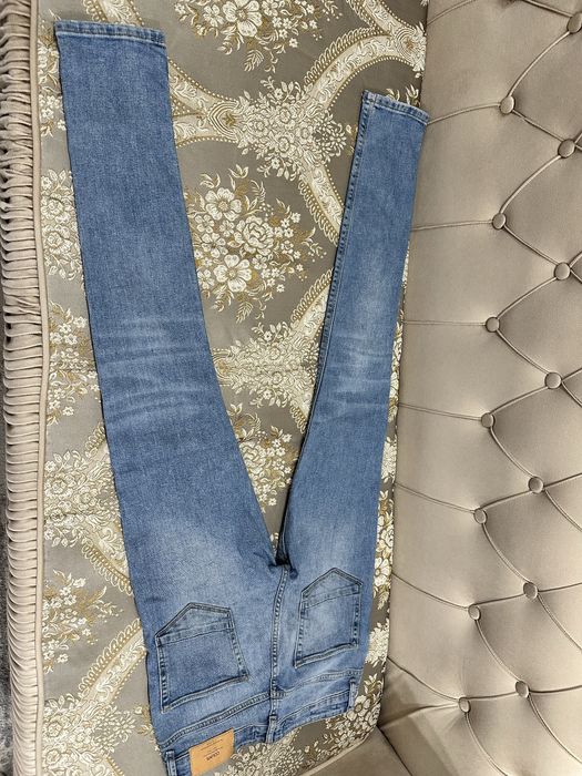 Новые джинсы colins