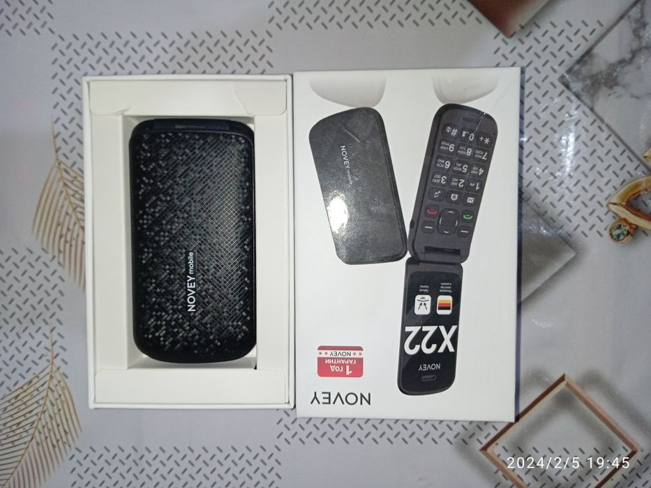 NOVEY-yengi hali ishlatilmagan garantiya taloni bor+naushnik,zaryadchi