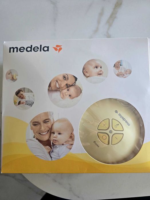 Молокотсос Medela Swing