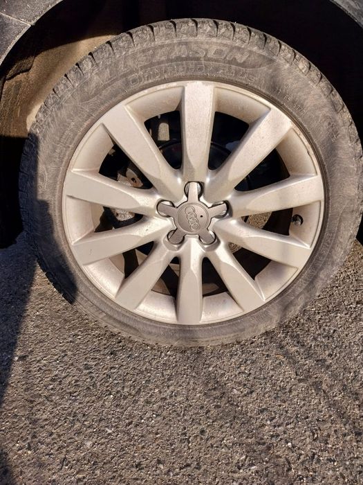Jante R16 5x100 Originale Audi A1 + 215/45 R16 Allseason Continental
