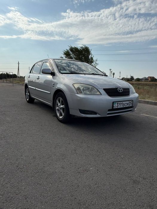 Тойота каролла 2003