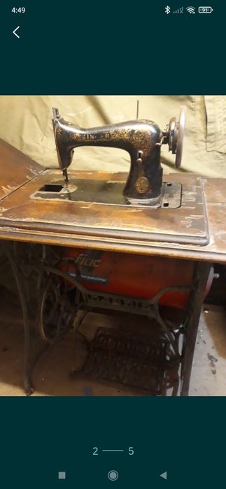 Mașina de cusut Singer