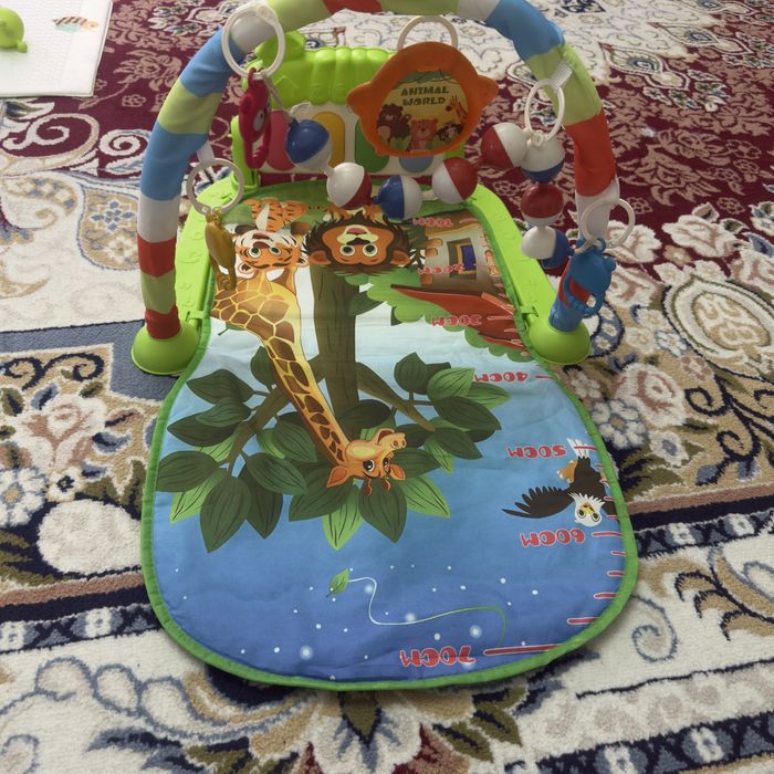 Продам развивающий коврик с пианино