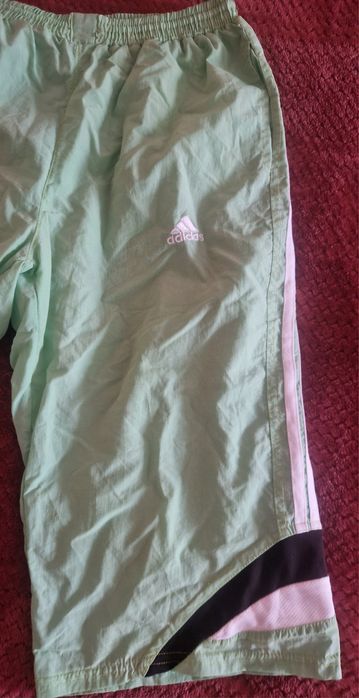 Pantaloni trei sferturi