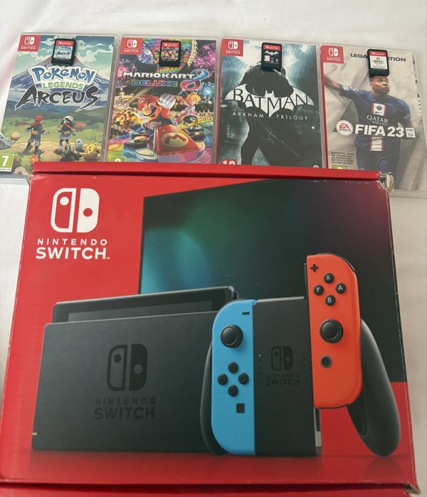 Nintendo Switch + 4 jocuri originale,stare excelentă.