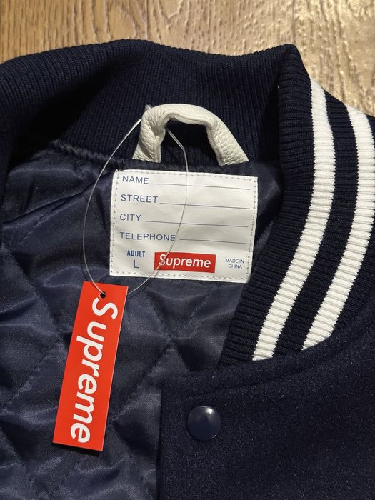 Supreme Praises Varsity Jacket