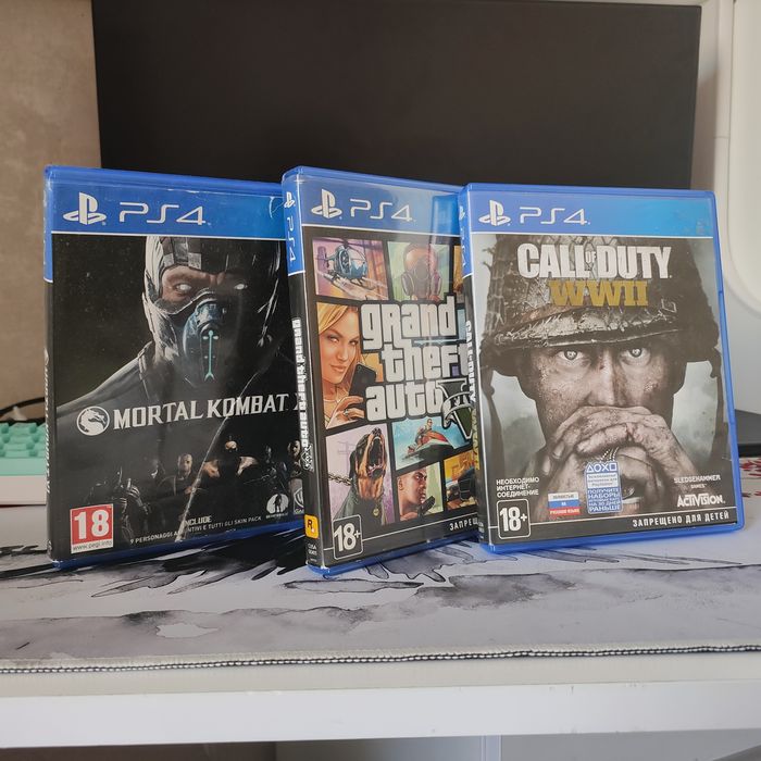 Диски пс4 и заряд.станция