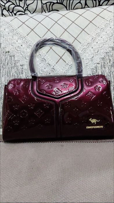 Ayollar sumkasi yangi