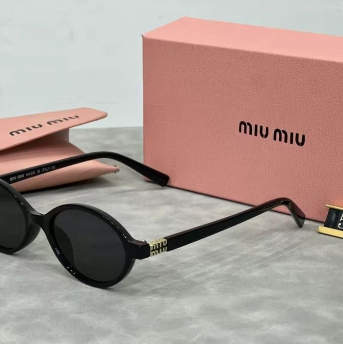 Солнцезащитные очки  Miu Miu (Миу Миу)